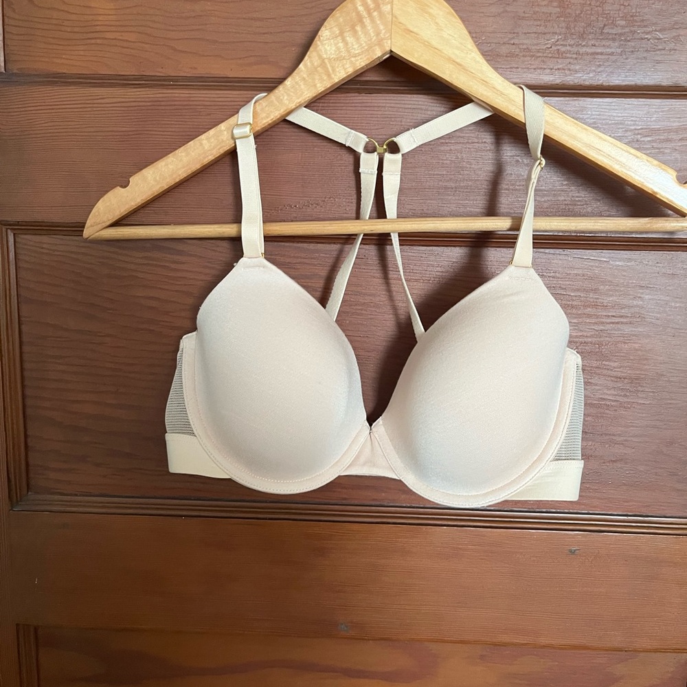 Lively bra. 34C. Never worn for extended period- only tried on. Cross back clasp